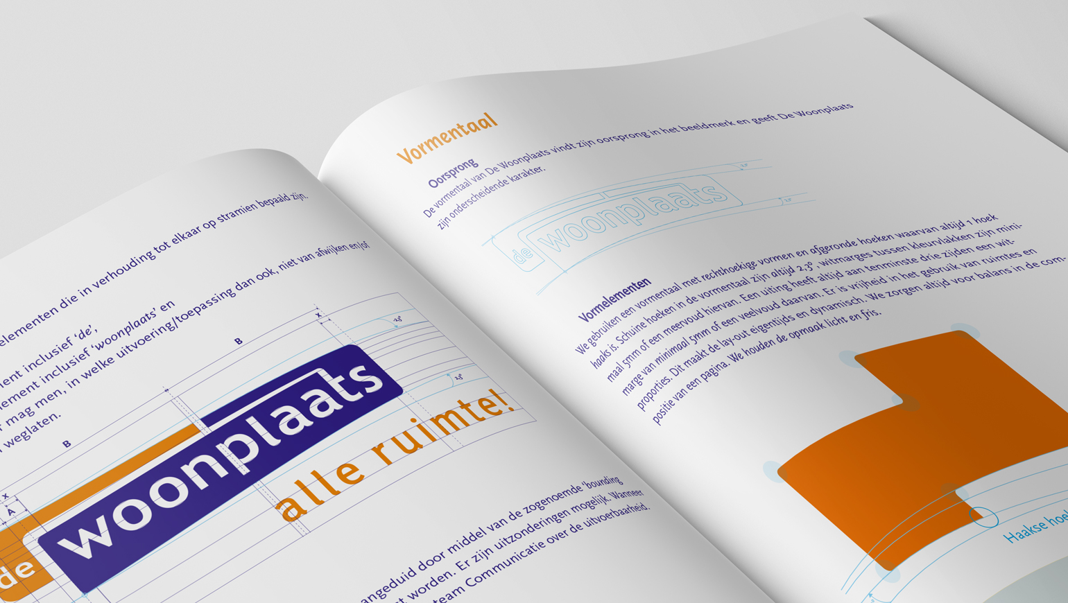 Opengevouwen huisstijl handboek van De Woonplaats