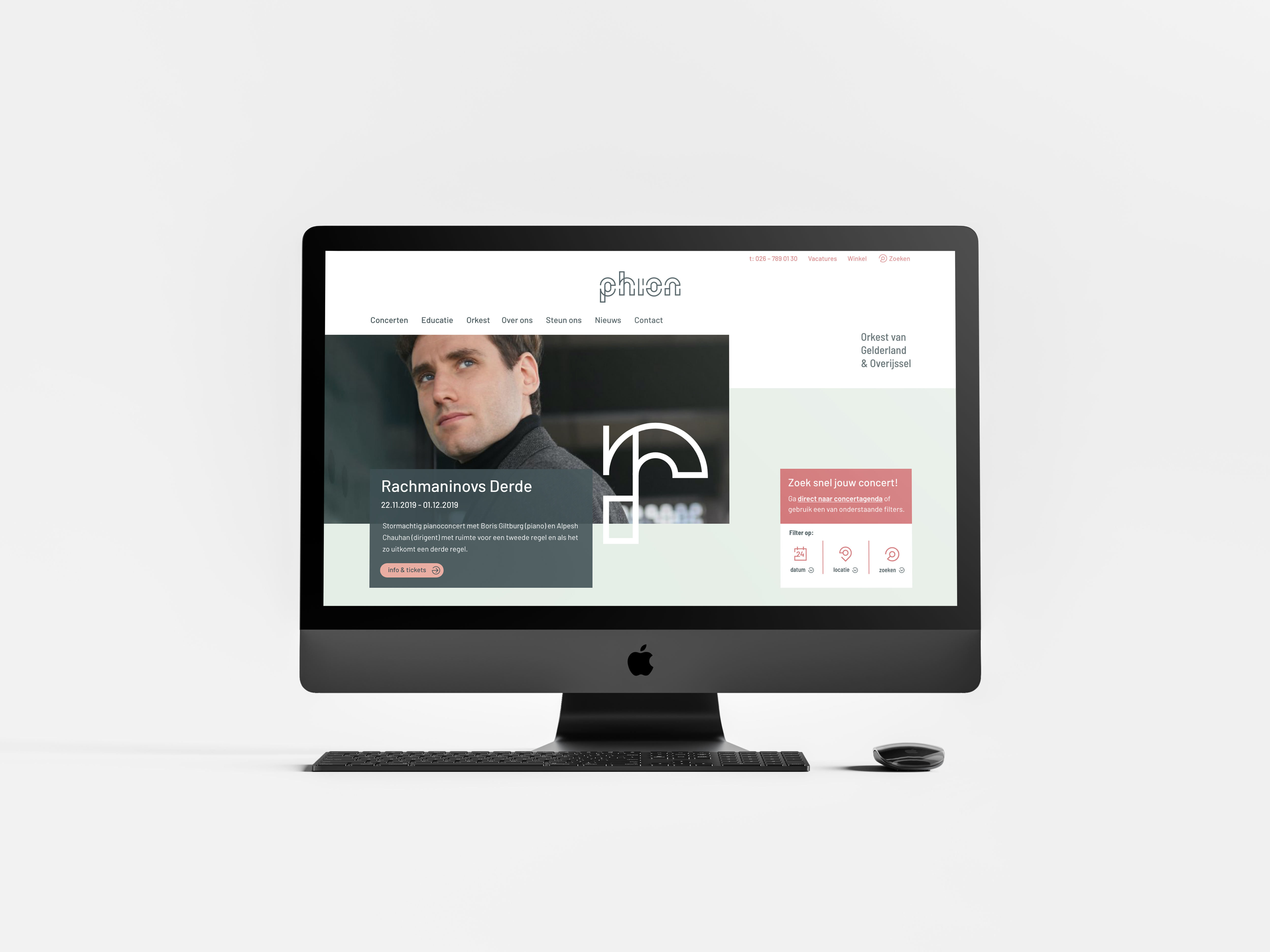 Grijze iMac met de website van Phion